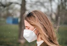 ‘미세먼지 차단숲 조성사업’ 사후관리 강화…엉뚱한 곳 못 쓴다 a woman wearing a face mask in a park