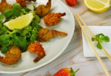 저탄수화물 식단이 체중 감량에 미치는 영향 a white plate topped with shrimp and greens